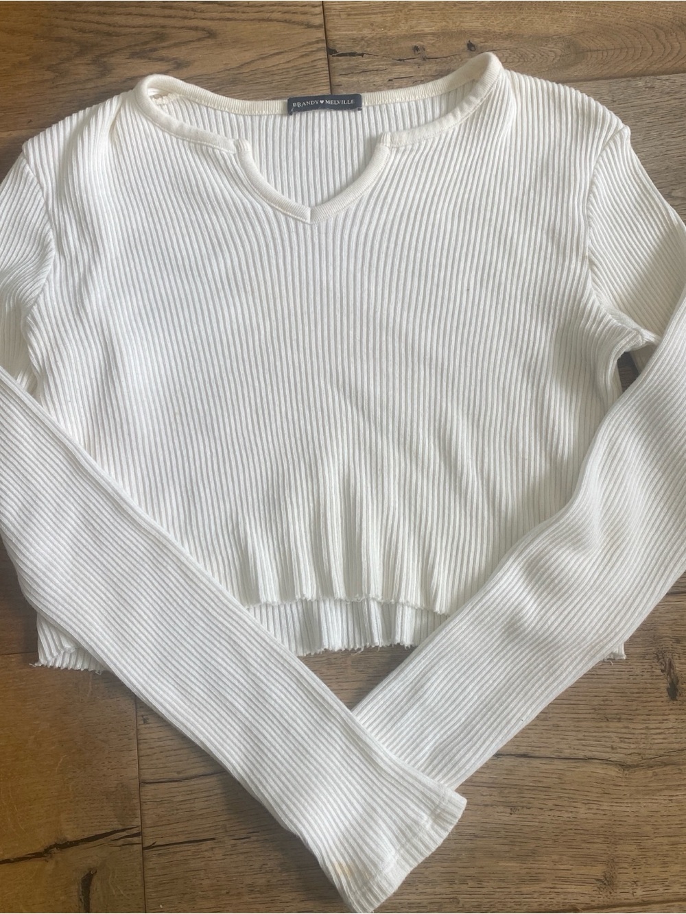 Brandy Melville Cream Ribbed Long-Sleeve Cropped Top with V-Notch